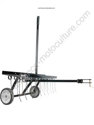 émousseur/scarificateur tracte/attele pour tondeuse autoportee